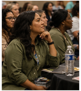 Women listening to teaching during the Pursuit for Passion conference