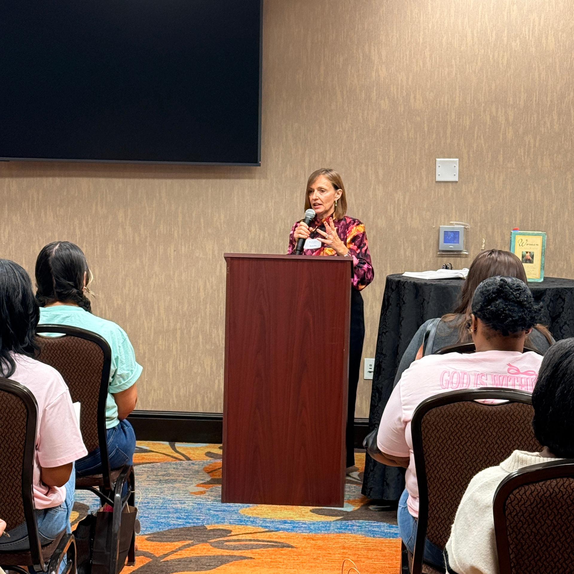A speaker teaching at the Pursuit for Passion conference